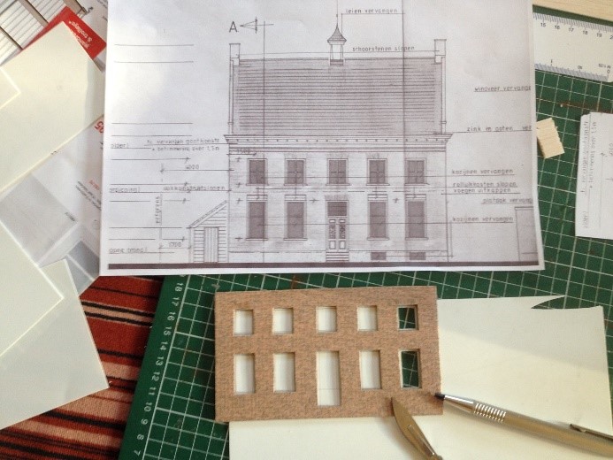 bouwtekening en miniatuurgevel